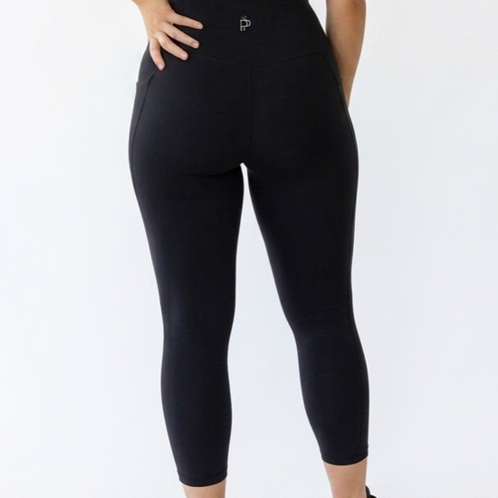 Black high-waisted 7/8 tights with no-roll-down waistband and phone pockets - Perky Peche