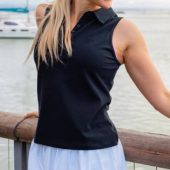 Woman wearing a black sleeveless polo shirt.