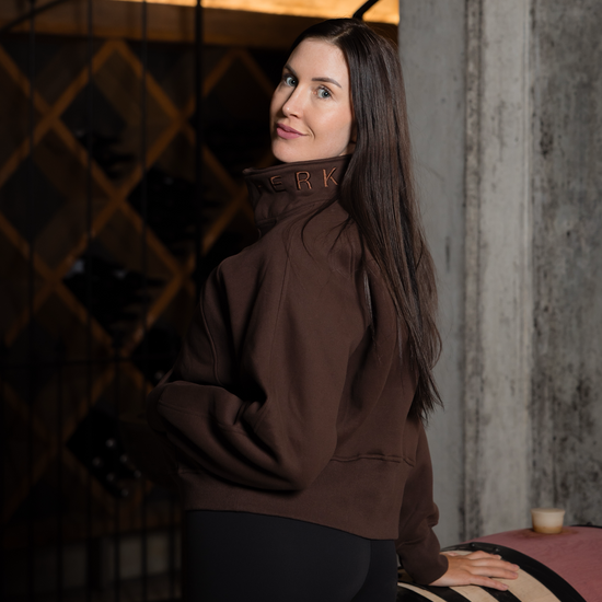 Women wearing half zip cropped jumper in chocolate brown