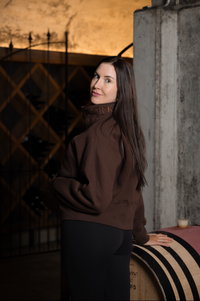 Women wearing half zip cropped jumper in chocolate brown