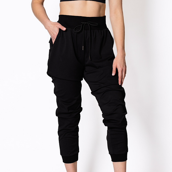 women wearing a black athletic outfit