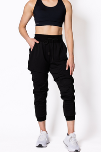 women wearing a black athletic outfit