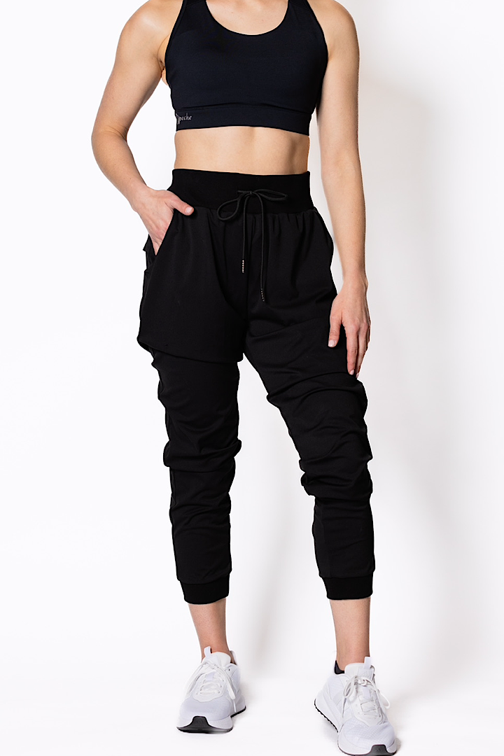 women wearing a black athletic outfit