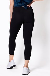 women wearing black tummy support 7/8 leggings