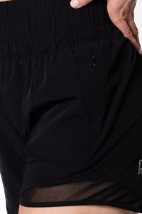 Women wearing black gym shorts