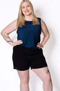 Curvy women wearing black gym shorts