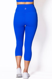 women wearing electric blue phone pocket leggings