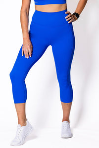 women wearing electric blue high waist leggings