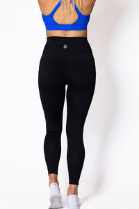 Women wearing high waist phone pocket tights with blue sports bra 