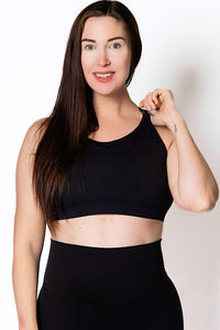 Women wearing a black breast-feeding sports bra