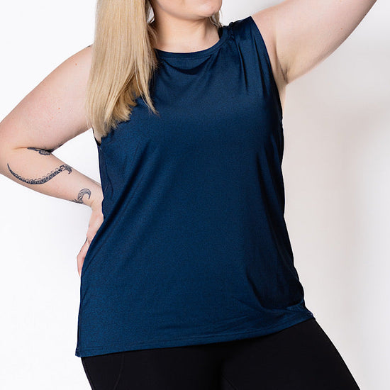 Woman wearing a blue relaxed tank