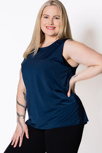 Woman wearing a blue sleeveless tank