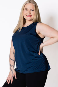 Woman wearing a blue sleeveless tank