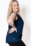  Curvy woman wearing a relaxed singlet top