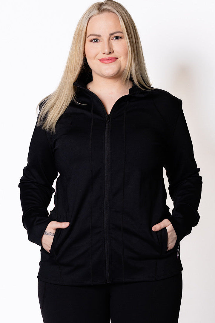 Woman wearing a black active jacket 