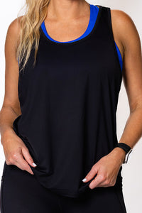 Woman wearing a black relaxed tank top