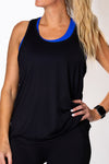 Woman wearing a black relaxed tank top