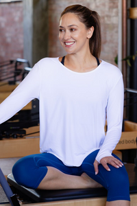 Women in uv long sleeve white top