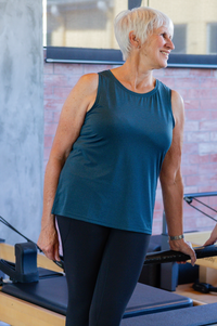 Women wearing light weight cool green tank