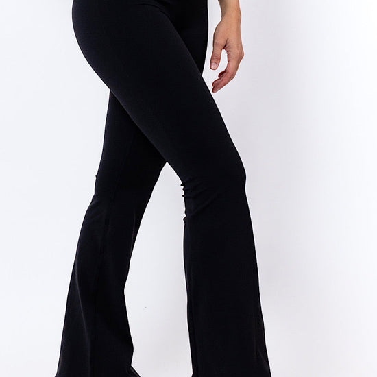women wearing comfy black flared tights 