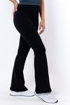 women wearing comfy black flared tights 