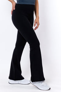 women wearing comfy black flared tights 