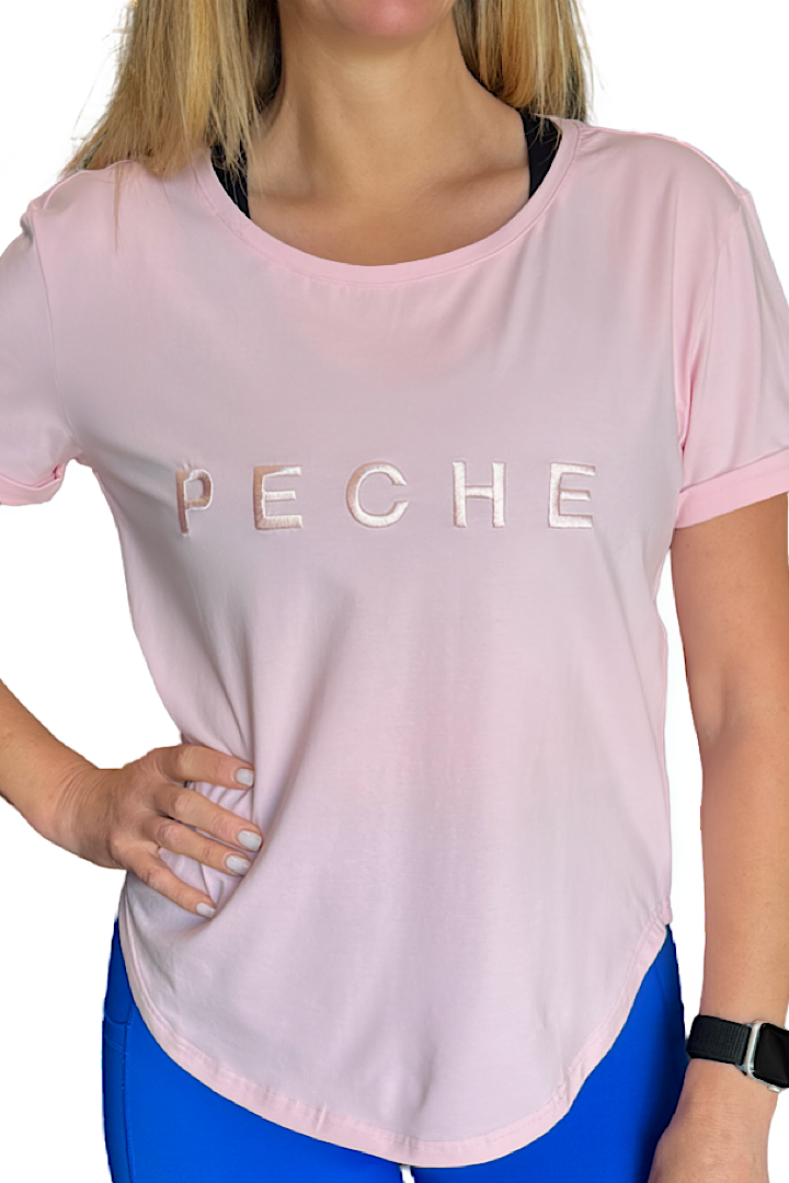 Women wearing pink wide scoop neck t-shirt