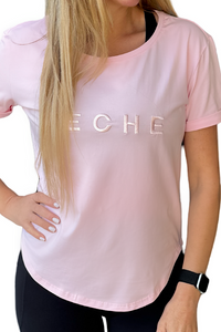 Women wearing pink scoop neck t-shirt