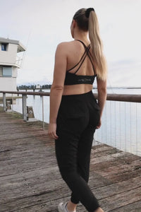 Woman wearing black walking pants