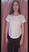 Women wearing a scoop neck white cotton t-shirt